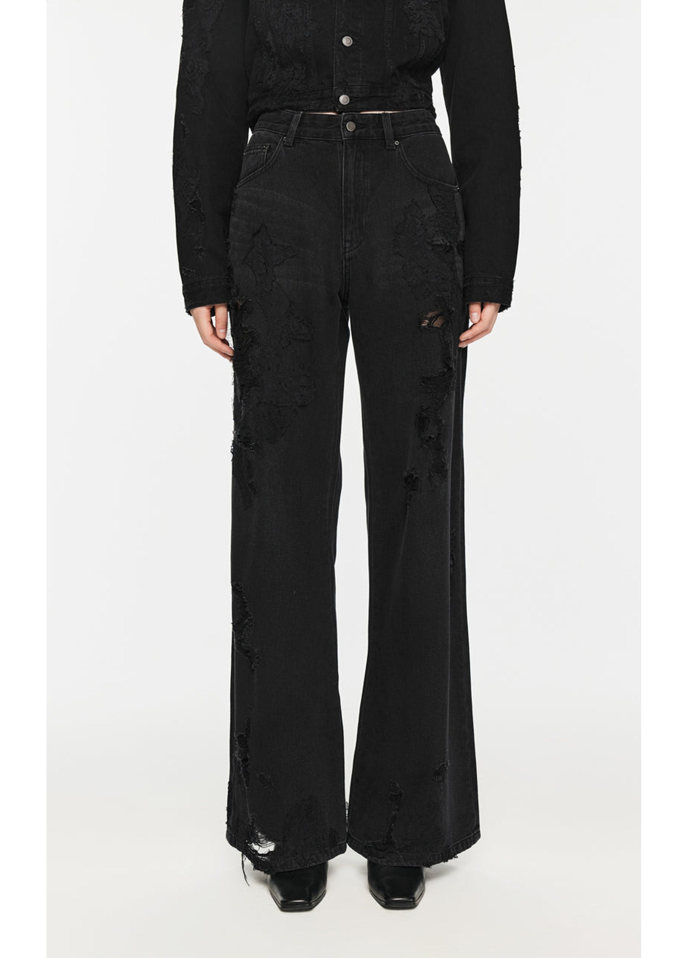 Jean à jambes larges avec effet usé/délavé